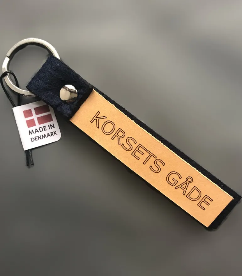 Nøglering, KORSETS GÅDE