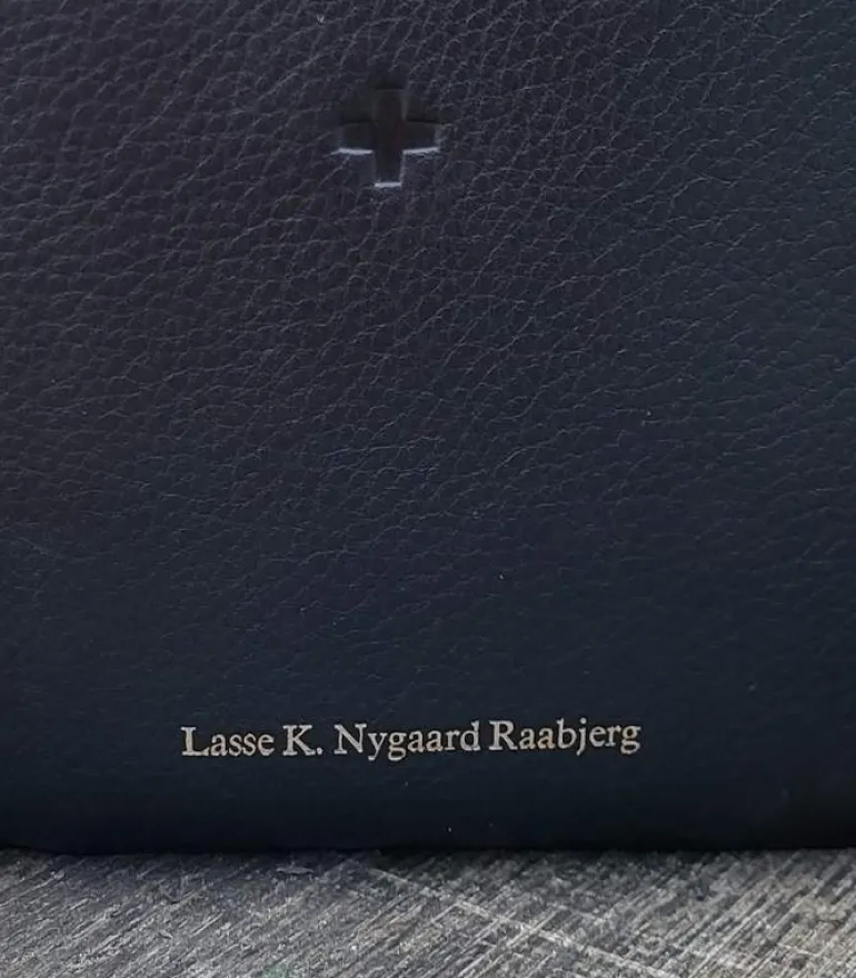 Tryk på bibel eller salmebog